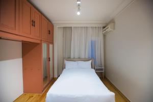 Postel nebo postele na pokoji v ubytování NicheNookStays