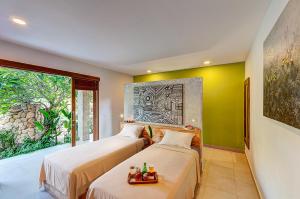 Llit o llits en una habitació de Ganesh Lodge