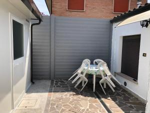 Patio nebo venkovní prostory v ubytování Alloggi Al Giardino & La Suite
