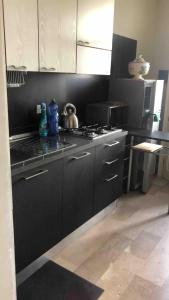 Kuchyň nebo kuchyňský kout v ubytování La luce dell'Est Appartamento in villa