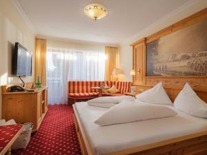Sjónvarps- og/eða afþreyingartæki á Hotel Alpina Wellness & Spa Resort