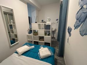 Postel nebo postele na pokoji v ubytování Seaside two-room apartment