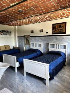 Postel nebo postele na pokoji v ubytování VillaGaia Apartment
