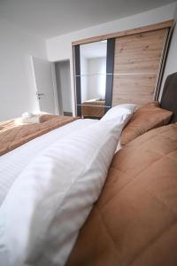 Postel nebo postele na pokoji v ubytování Apartman Bašić