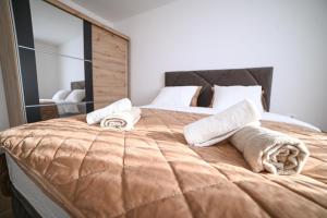 Postel nebo postele na pokoji v ubytování Apartman Bašić