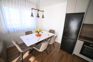 Kuchyň nebo kuchyňský kout v ubytování Apartman Bašić