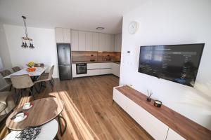 Kuchyň nebo kuchyňský kout v ubytování Apartman Bašić