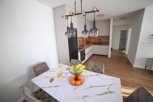 Kuchyň nebo kuchyňský kout v ubytování Apartman Bašić