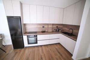 Kuchyň nebo kuchyňský kout v ubytování Apartman Bašić