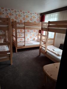 Rúm í herbergi á Ferienheim Sorgenfrei