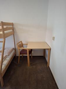 Rúm í herbergi á Ferienheim Sorgenfrei