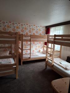 Rúm í herbergi á Ferienheim Sorgenfrei