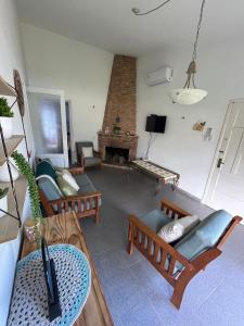 En TV eller et underholdningssystem på Casa en balneario Costa Azul a 2 cuadras de la playa