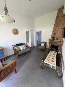 Et sittehjørne på Casa en balneario Costa Azul a 2 cuadras de la playa