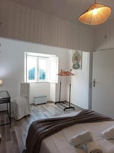 Una cama o camas en una habitación de Vila Sunrise