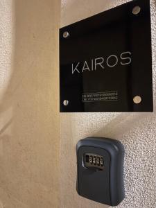 a remote control is attached to a wall at Kairos in Brindisi