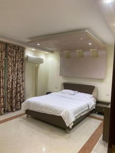 Ένα ή περισσότερα κρεβάτια σε δωμάτιο στο Z m apartment hotel