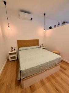 En eller flere senge i et værelse på Apartamento Euromar 6