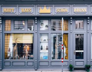 a store front with a lot of windows at Mauthaus Schönbrunn in Vienna