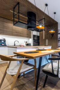 Nhà bếp/bếp nhỏ tại APART Rogatek Szlachetny Pod Giewontem