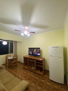 Et tv og/eller underholdning på Apartamento Vista da Praia Espetacular! + 19 billeder