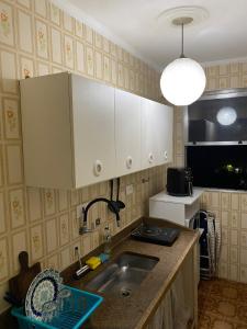 Køkken eller tekøkken på Apartamento Vista da Praia Espetacular!