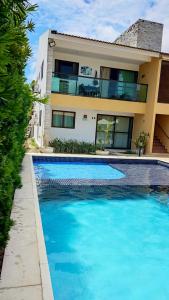 Bazén v ubytování Casa de praia em Maria Farinha - Pe. nebo v jeho okolí