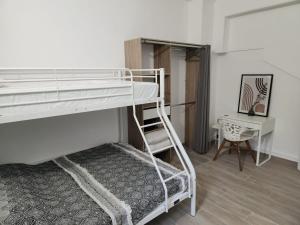 Katil atau katil-katil dalam bilik di Logement familial avec jardin