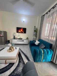 Χώρος καθιστικού στο Aura Homes