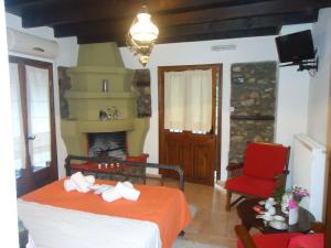 Postel nebo postele na pokoji v ubytování Traditional Guesthouse Archontoula