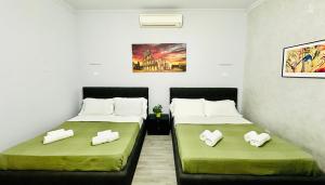 Postel nebo postele na pokoji v ubytování Termini luxury home + 148 fotografií