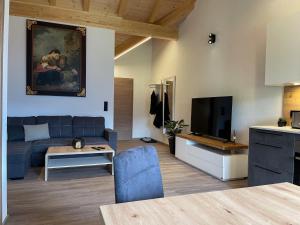 Televízia a/alebo spoločenská miestnosť v ubytovaní Apartment in Kaunerberg near Ski Resort