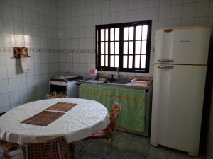 Η κουζίνα ή μικρή κουζίνα στο Sobrado no litoral norte de são Sebastião