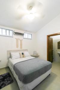 Voodi või voodid majutusasutuse Pineapple House toas