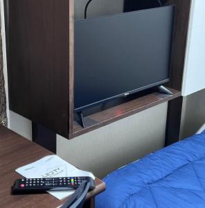 TV a/nebo společenská místnost v ubytování Jangwon Livingtel & Guesthouse