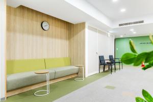 Posezení v ubytování Mu Chen Hotel
