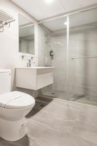 Koupelna v ubytování Mu Chen Hotel