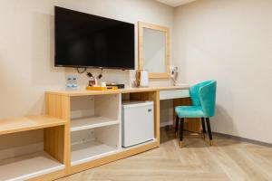 Kuchyň nebo kuchyňský kout v ubytování Mu Chen Hotel