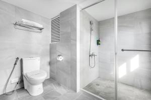 Koupelna v ubytování Mu Chen Hotel