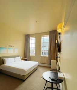 Postel nebo postele na pokoji v ubytování Grand Central Serviced Apartments