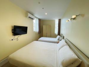 Postel nebo postele na pokoji v ubytování Grand Central Serviced Apartments