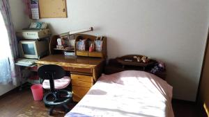 Postel nebo postele na pokoji v ubytování OSO Homestay