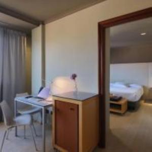 Posteľ alebo postele v izbe v ubytovaní Hotel Almirante