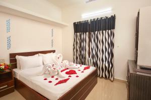 Ένα ή περισσότερα κρεβάτια σε δωμάτιο στο Cinnamon stay