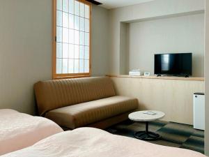 โทรทัศน์และ/หรือระบบความบันเทิงของ Hotel Hanakomichi - Vacation STAY 27612v