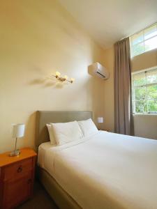 Postel nebo postele na pokoji v ubytování Grand Central Serviced Apartments
