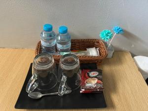 a basket filled with bottles of water on a table at Vientiane Star Hotel B in Vientiane