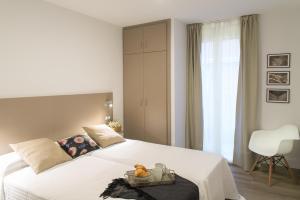 
Cama o camas de una habitación en Apartamentos Campo Del Príncipe
