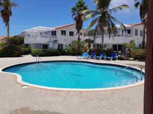 Bazén v ubytování Marazul Dive Apartment F1 nebo v jeho okolí