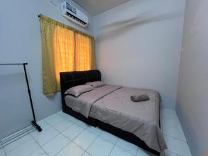 Postel nebo postele na pokoji v ubytování Teratak Segar Bayu - Musslim Only Tanjong Malim Perak + 2 fotografie